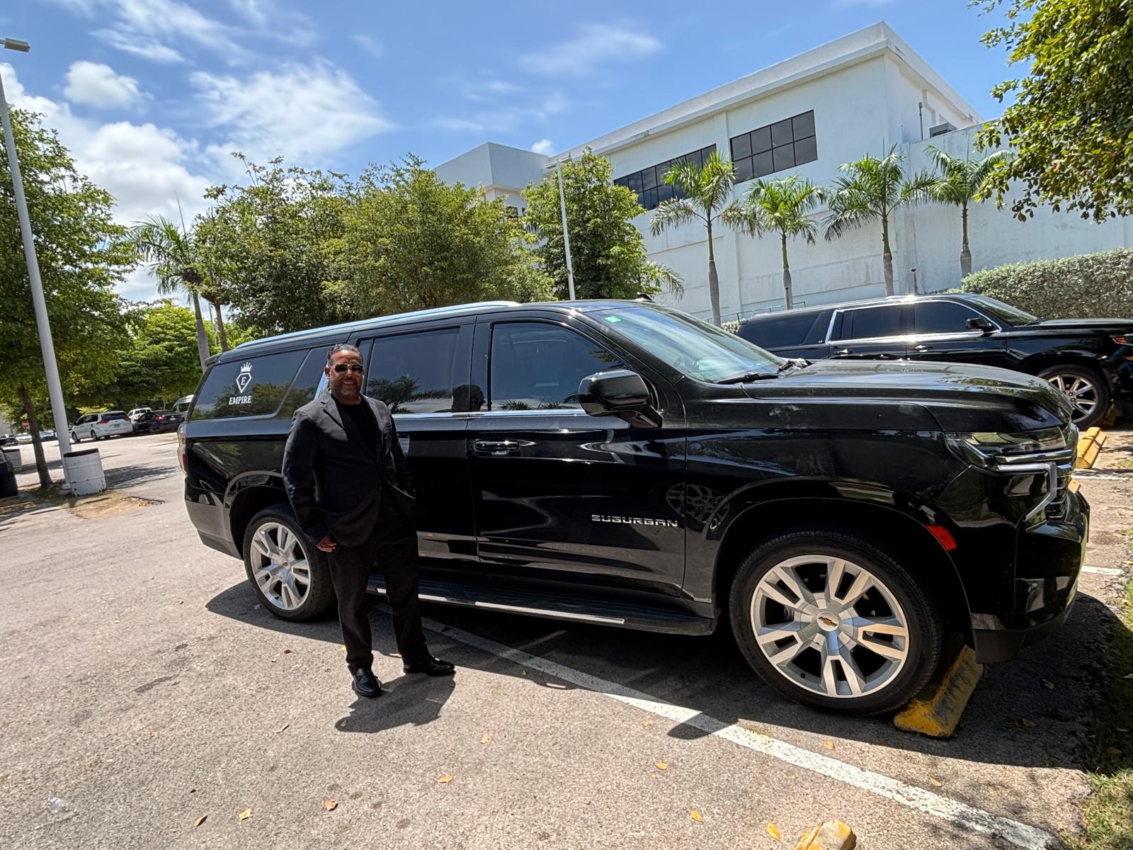 Chevrolet Suburban luxury SUV with professional driver
